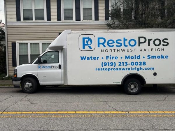 RestoPros of Raleigh's service van providing water damage Raleigh